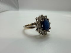 Oval sapphire and diamond ring 14KT gold