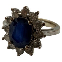 Anello ovale con zaffiro e diamante in oro 14KT