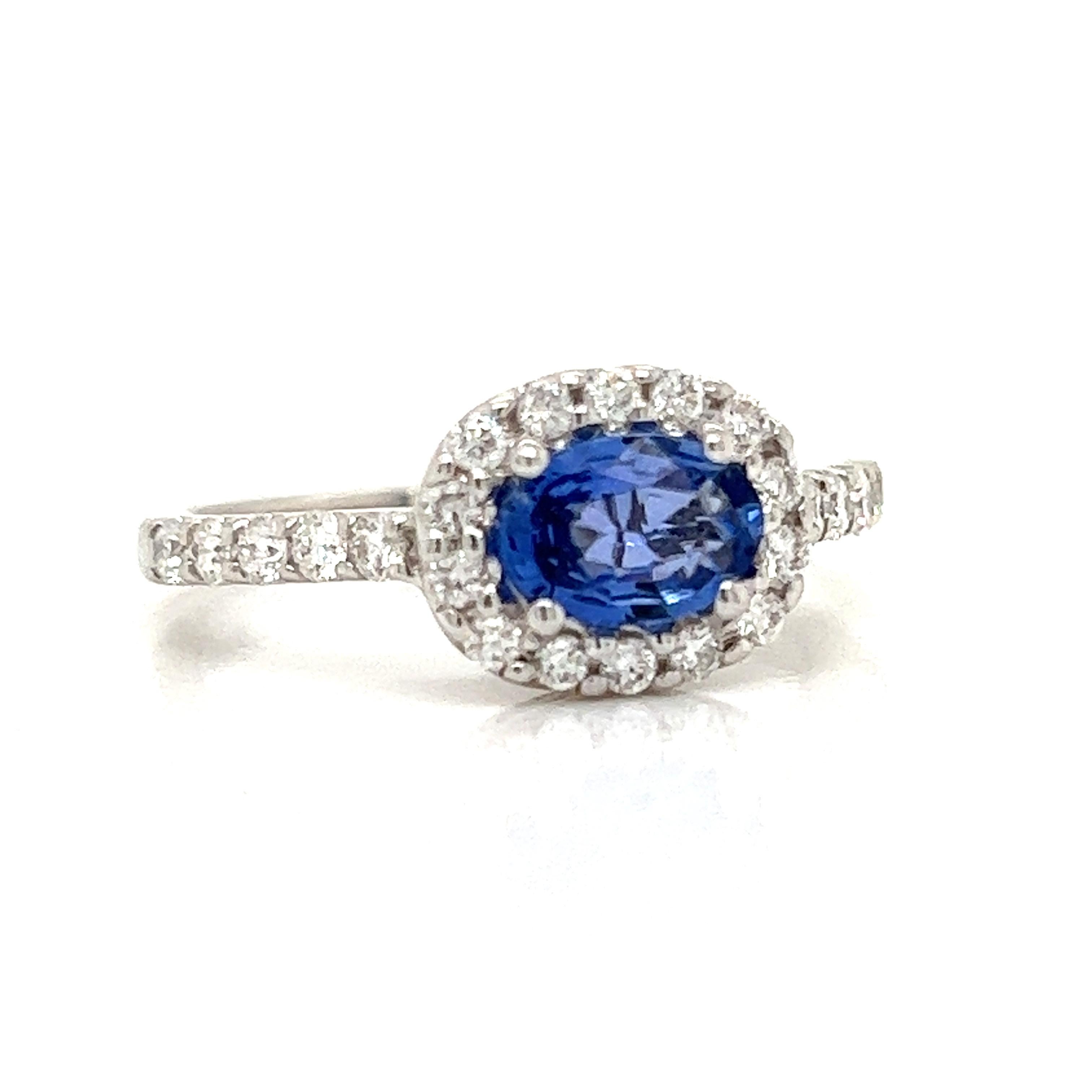 Modern Oval Sapphire and Diamond Ring For Sale