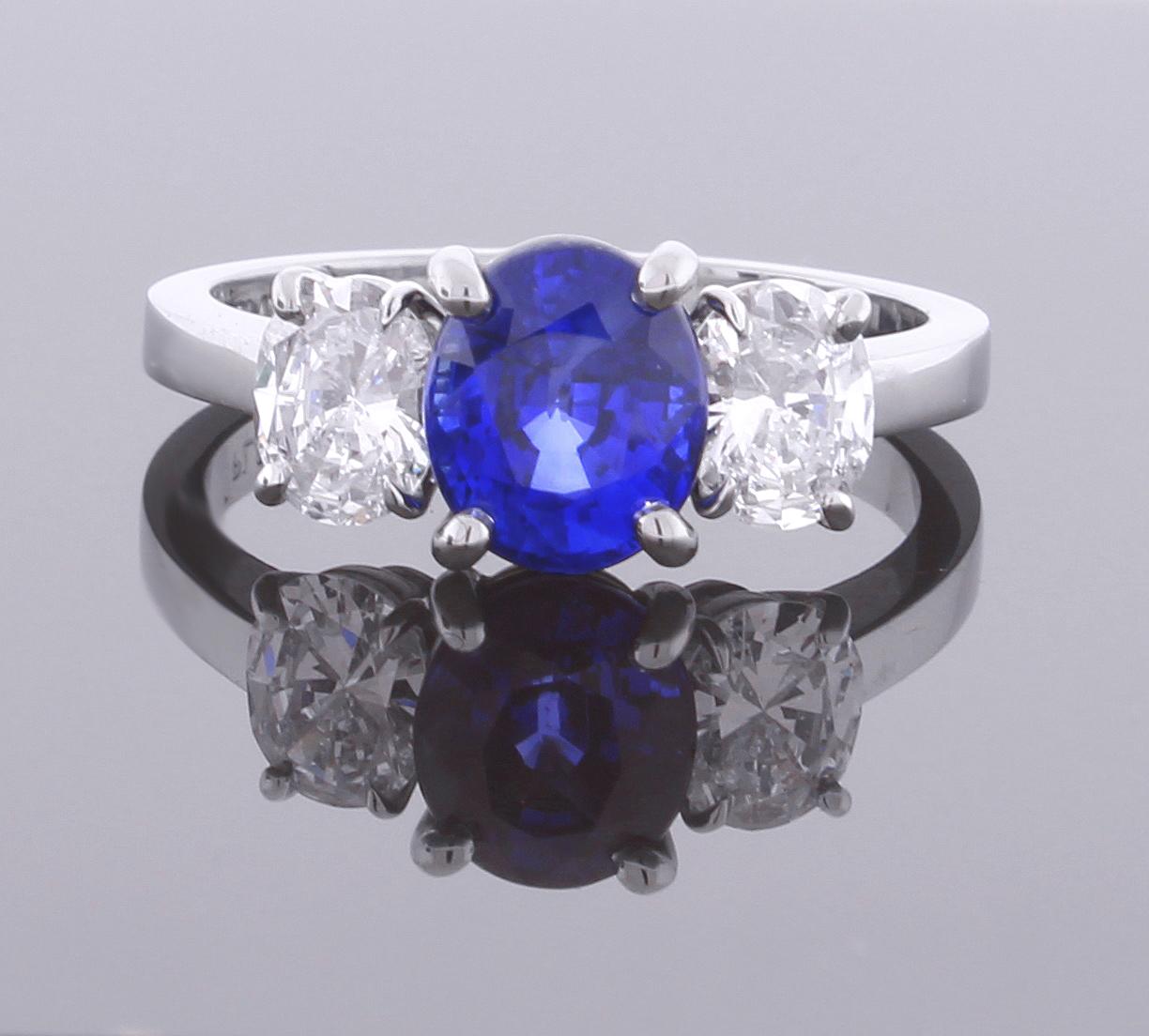 Oval Cut Oval Sapphire and Diamond Three-Stone Ring