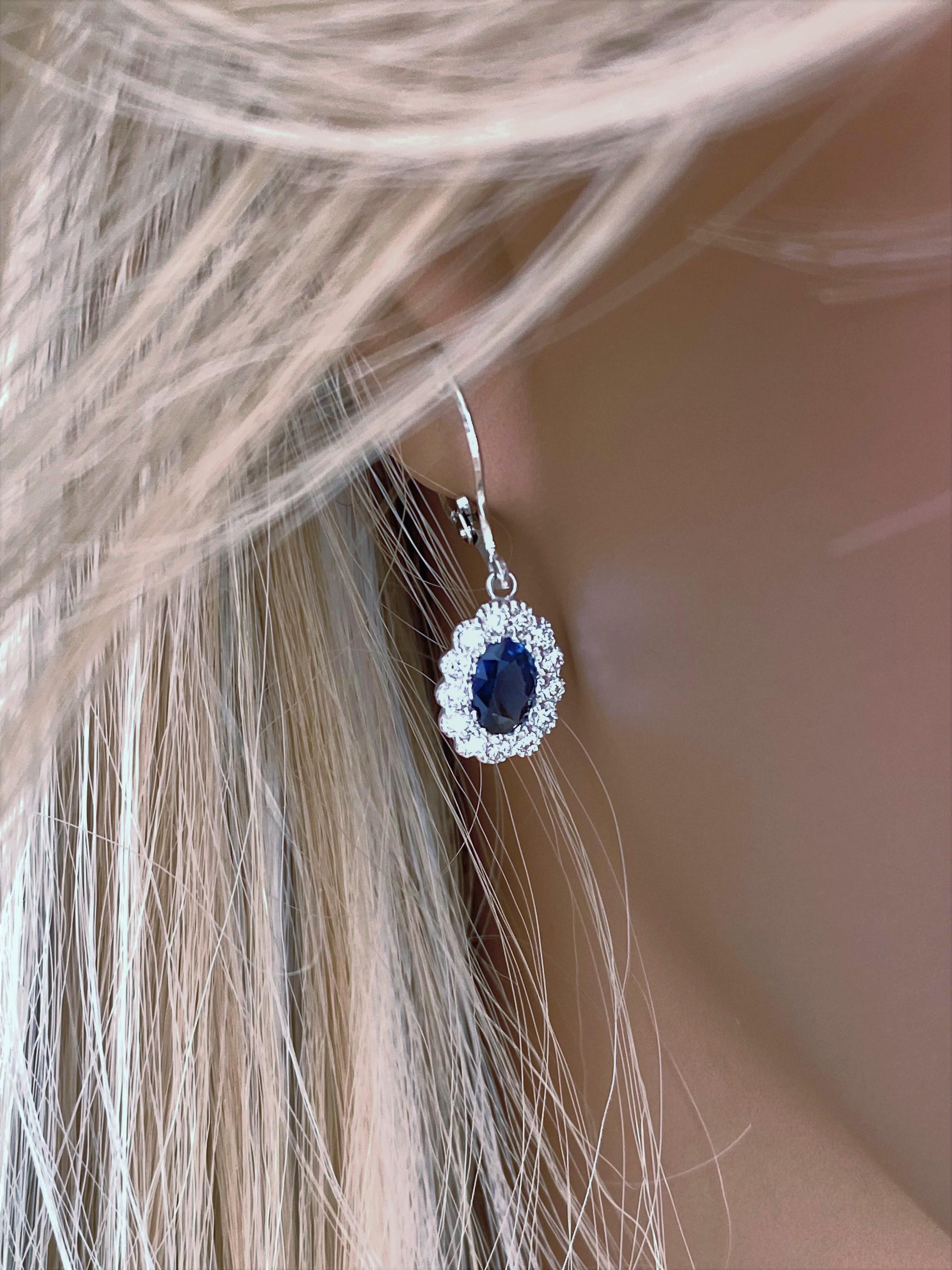 Contemporary Ceylon Oval Sapphire and Diamond White Gold Cluster Lever Back Earrings