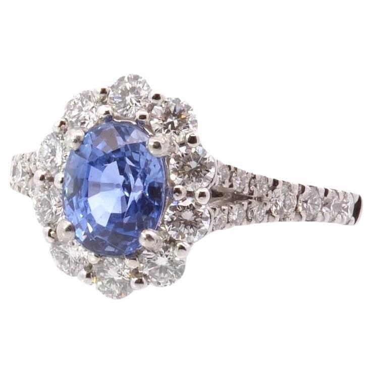 Oval sapphire and diamonds ring For Sale