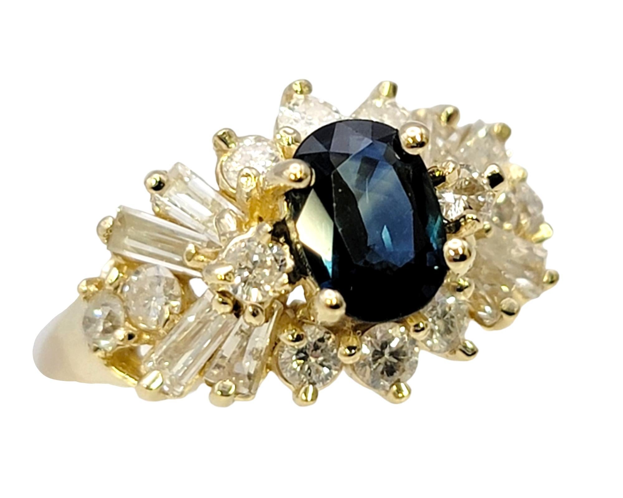 Contemporary Oval Sapphire and Multi Diamond Cluster Band Ring in 14 Karat Yellow Gold