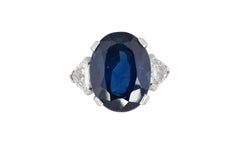 Oval Sapphire and Trillion Diamond Three Stone Platinum Ring