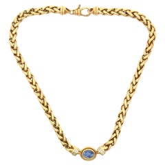 Collana con zaffiro ovale e castone cubano A Link in oro giallo 18 carati 52,4 grammi 18"