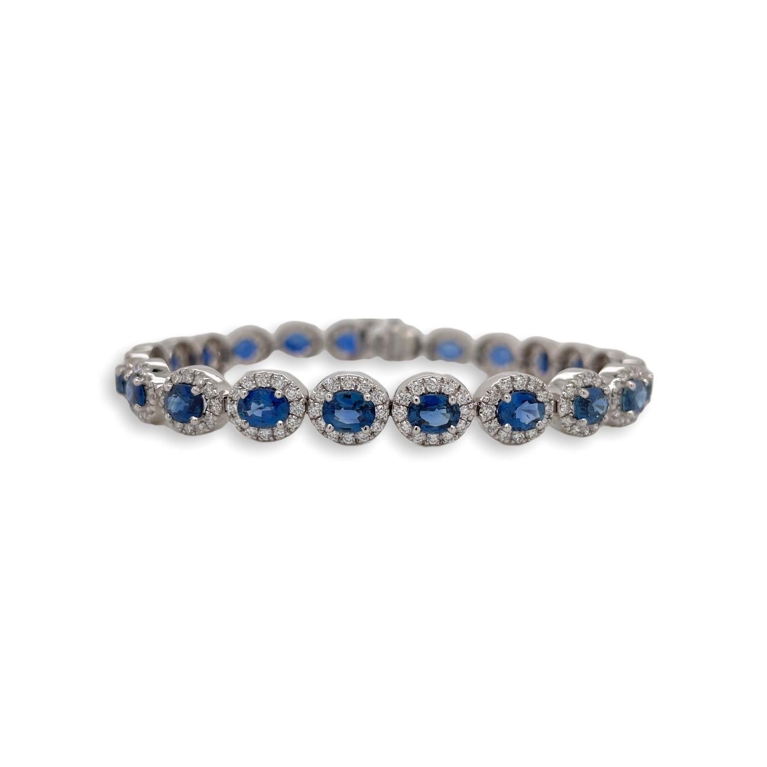 Bracelet contains 22 finely matched oval brilliant sapphires, 9.87tcw and 264 round brilliant diamonds, 2.65tcw.  Diamonds are colorless and VS2 in clarity, excellent cut. All stones are mounted in handmade prong settings. Bracelet measures 7