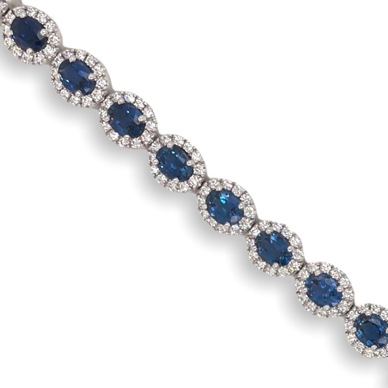 Contemporary Oval Sapphire & Diamond Halo Bracelet in 18K White Gold