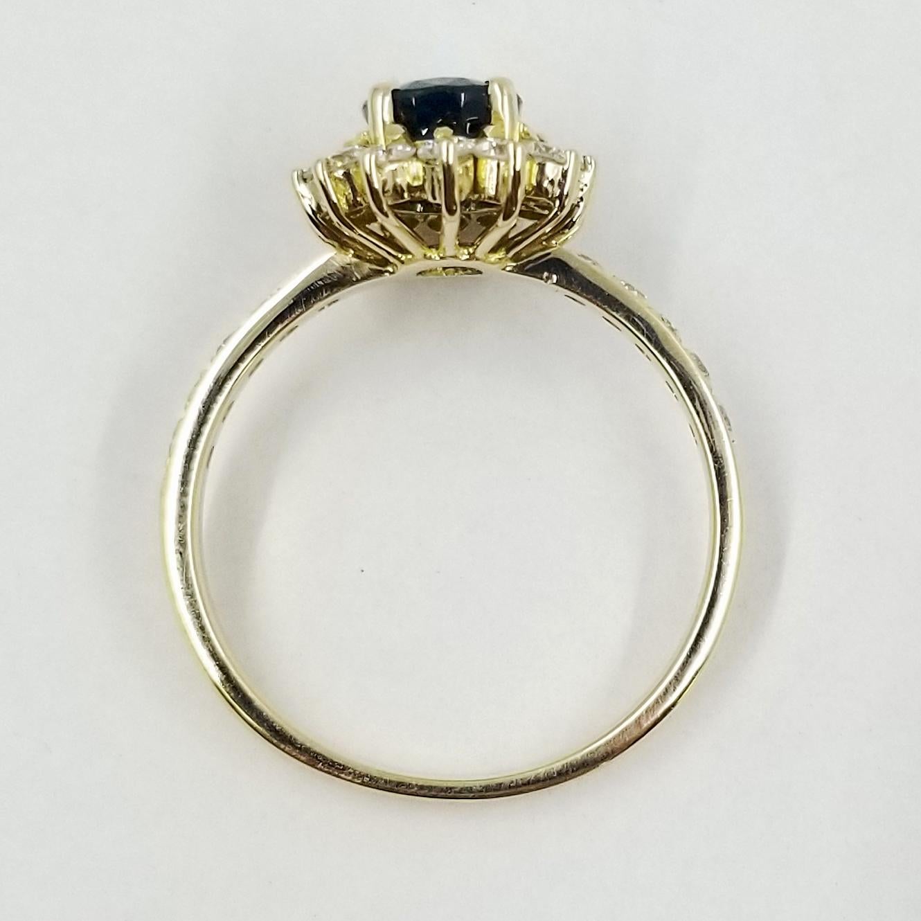 Oval Cut Oval Sapphire and Diamond Halo Ring