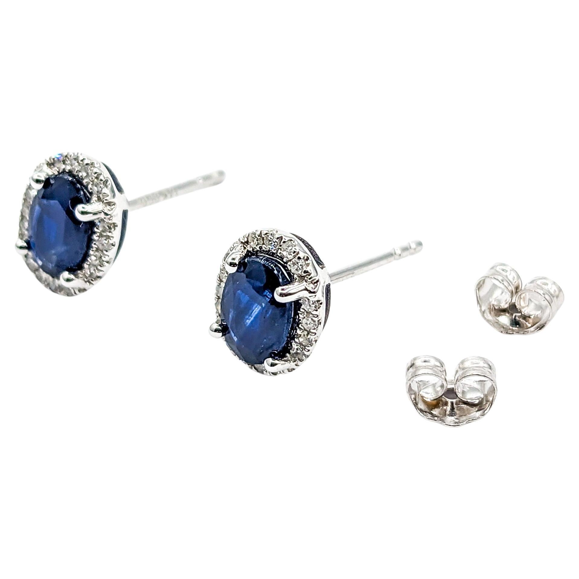 Oval Sapphire & Diamond Stud Earring White Gold

Introducing our exquisite earrings, elegantly crafted in 14 karat white gold, featuring stud 0.10ctw diamonds that exude sparkle. These diamonds, with SI-I clarity and near colorless quality, add a