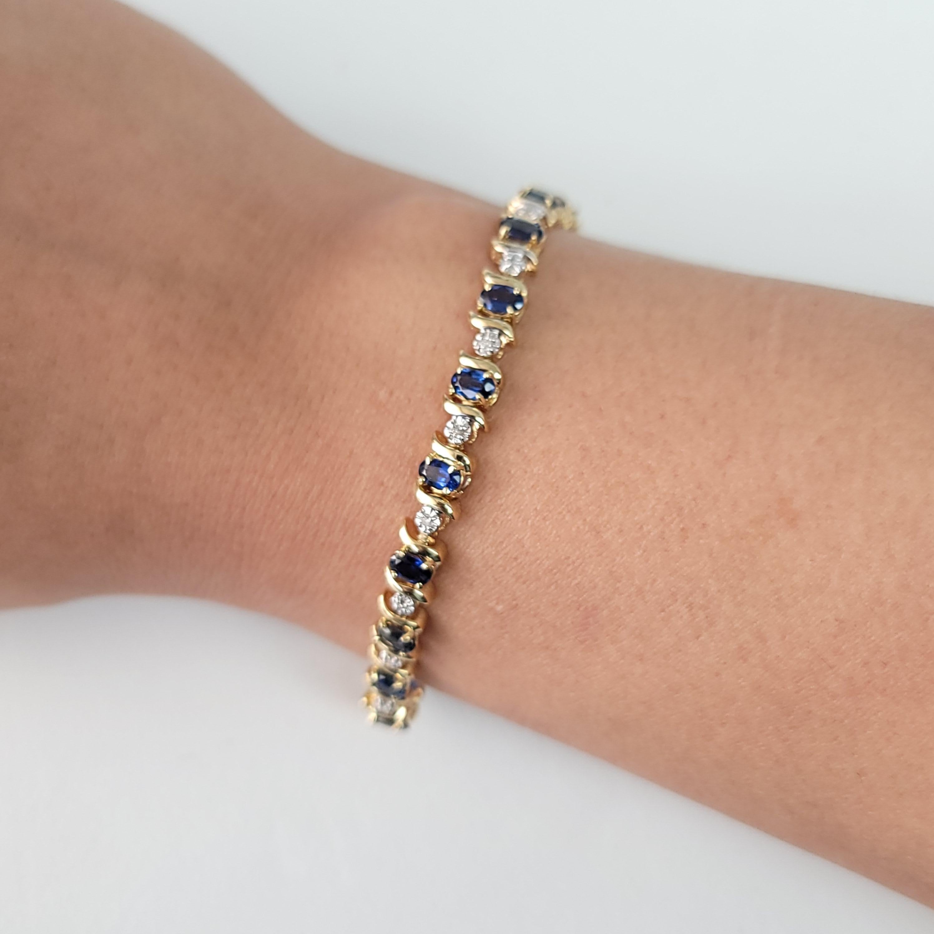 Taglio ovale Bracciale tennis con zaffiro ovale e diamanti in oro giallo 14k in vendita
