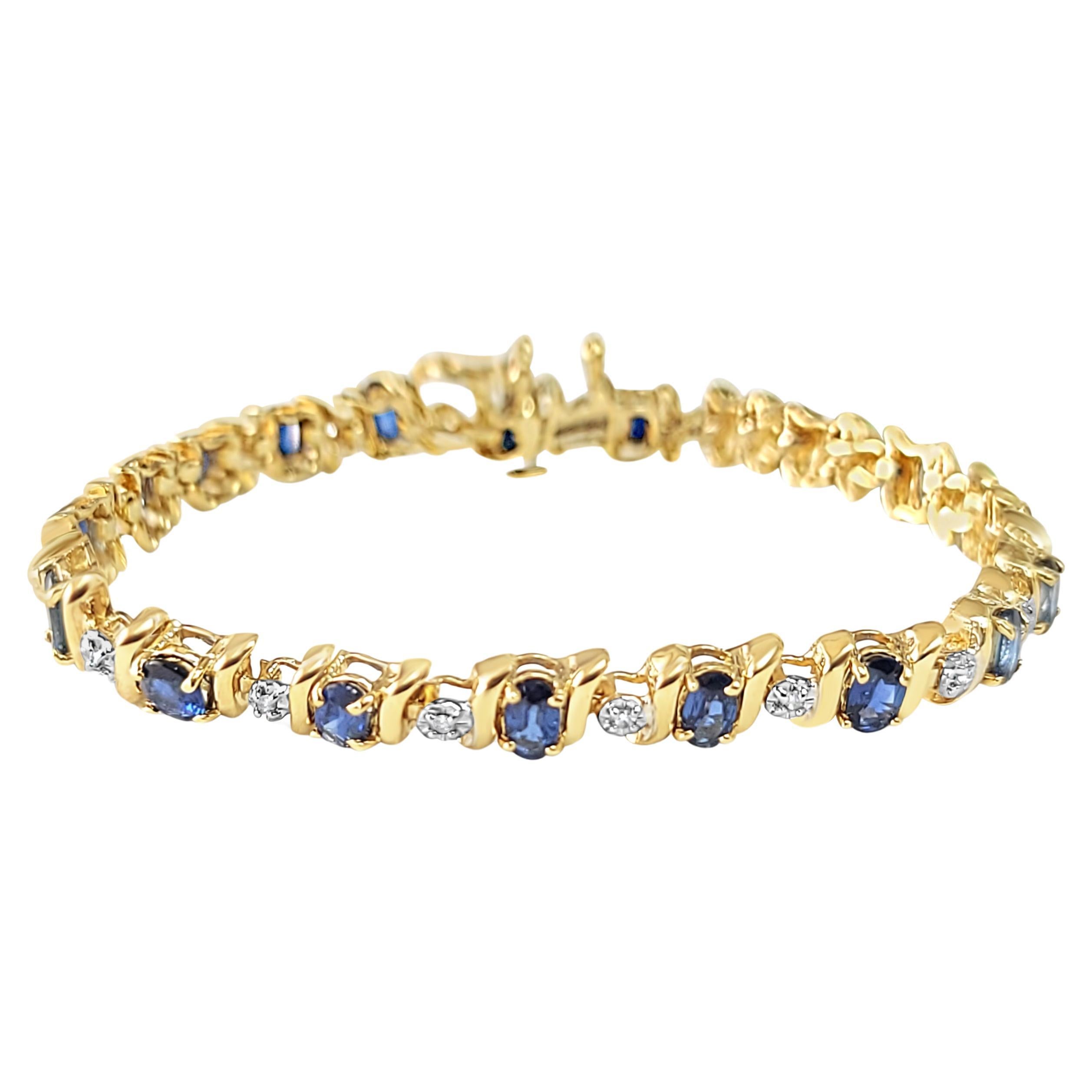 Bracelet tennis en or jaune 14 carats avec saphirs ovales et diamants