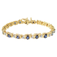 Bracelet tennis en or jaune 14 carats avec saphirs ovales et diamants