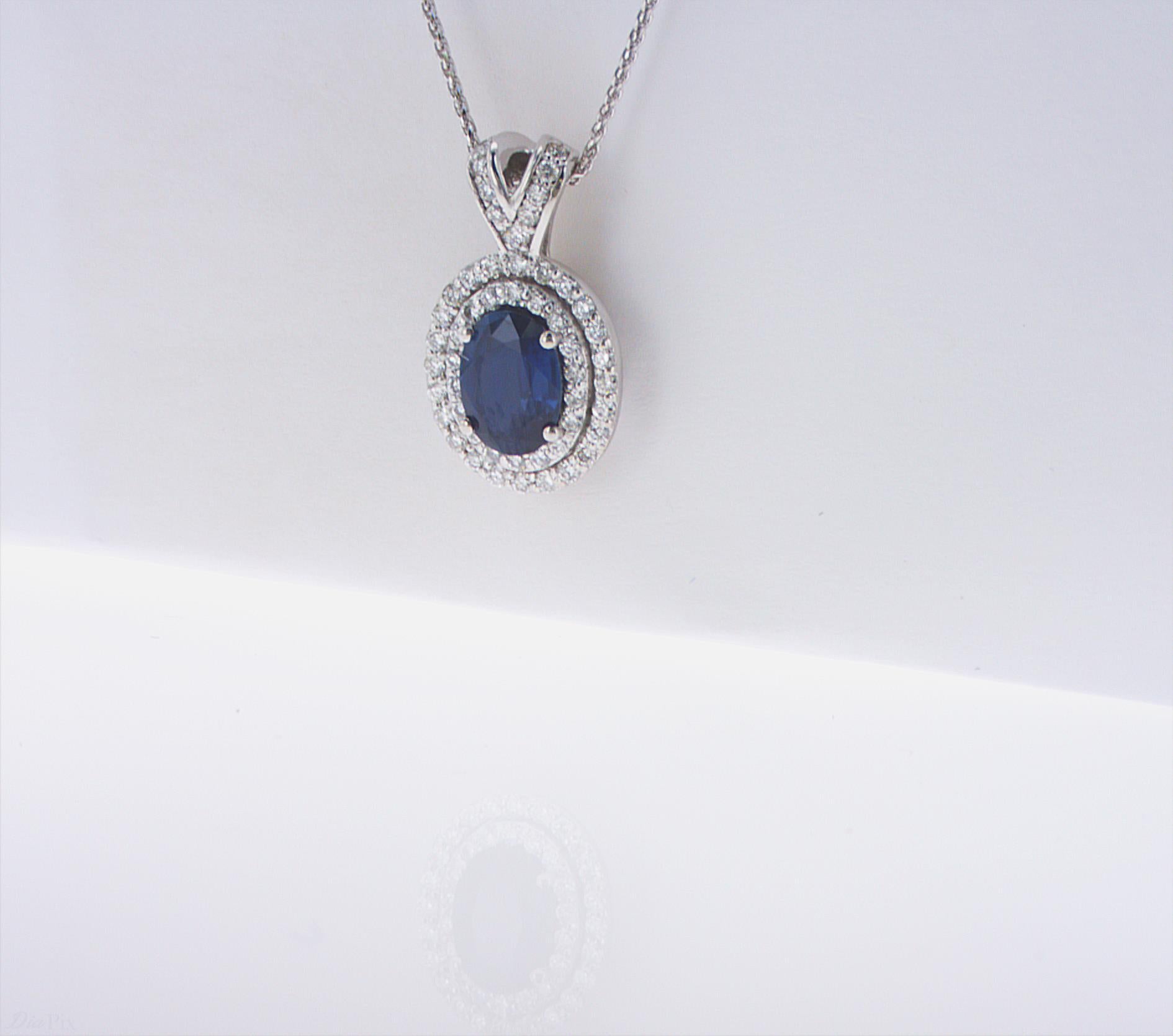 Modern Oval Sapphire Double Halo Pendant For Sale