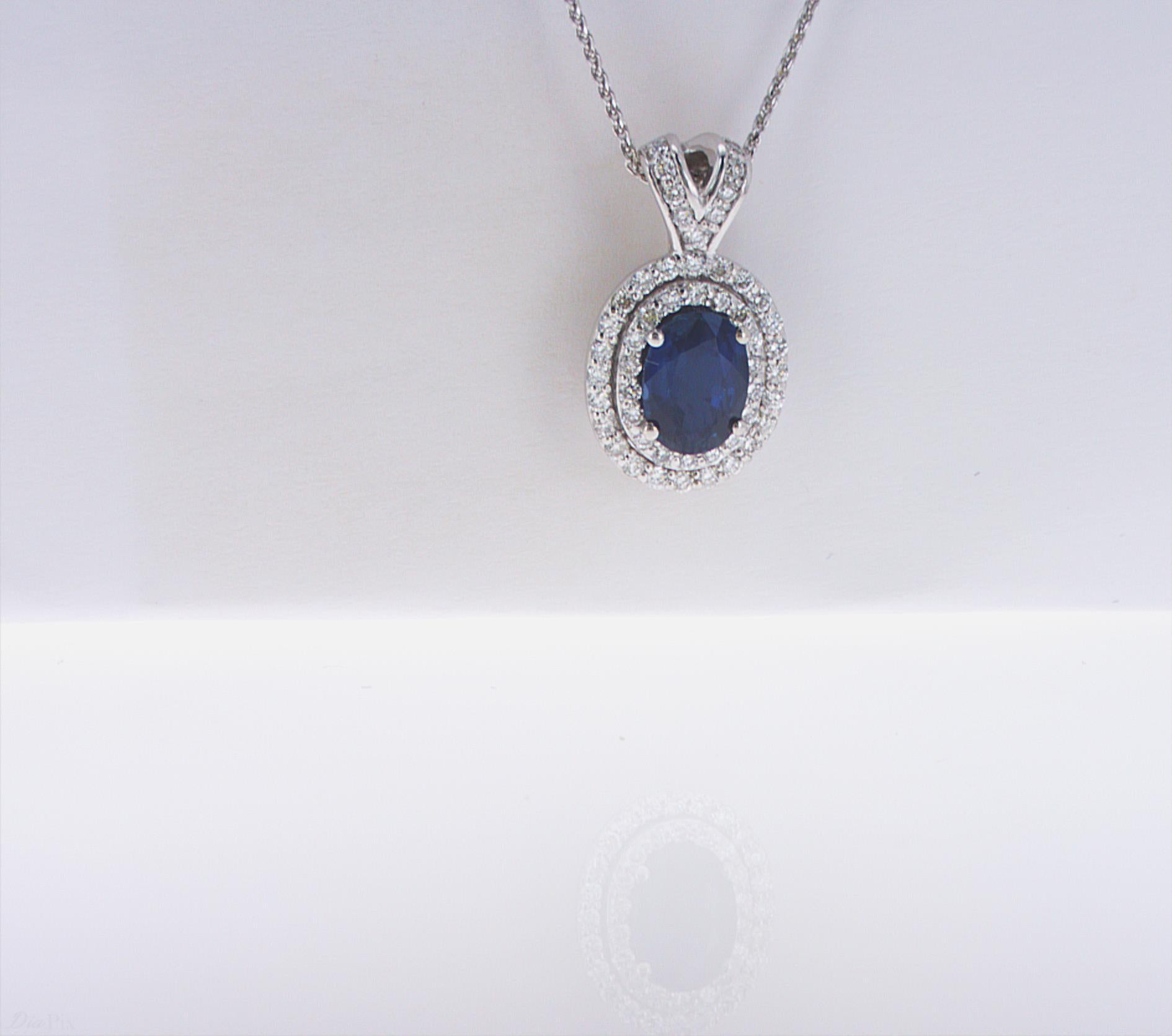 Oval Sapphire Double Halo Pendant In New Condition For Sale In New York, NY