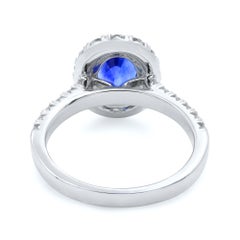 Oval Sapphire Halo Set Diamond Engagement Ring 18 Karat White Gold