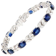 Bracciale d'oro con zaffiro ovale e diamante marquise