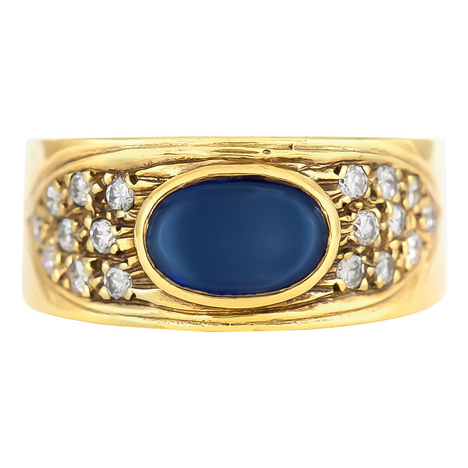 Oval Sapphire on 18 Karat Yellow Gold Setting with Diamonds For Sale