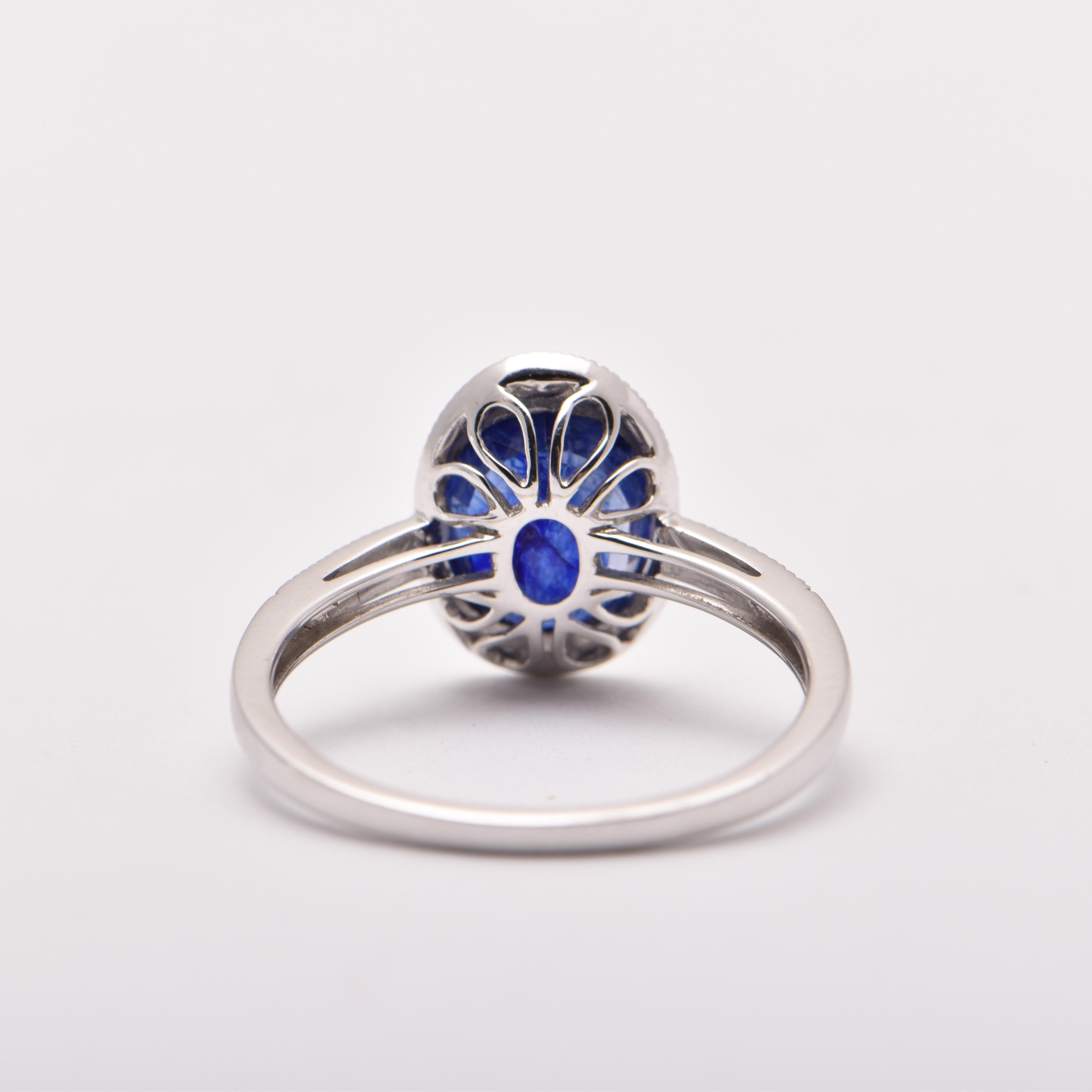 Oval Cut Oval Sapphire 'Treated' and Diamond Cocktail Ring in 18 Carat White Gold For Sale