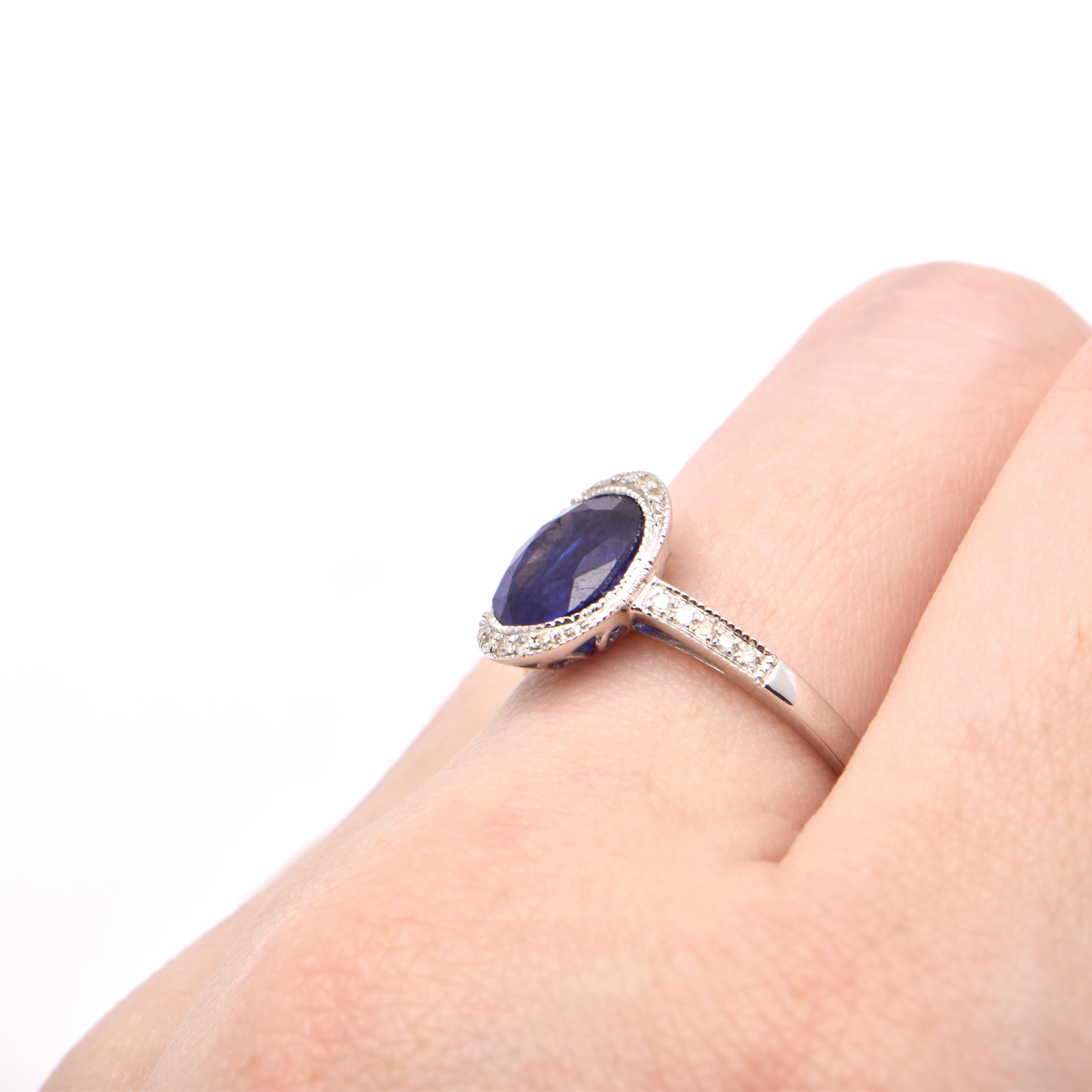 Women's or Men's Oval Sapphire 'Treated' and Diamond Cocktail Ring in 18 Carat White Gold For Sale