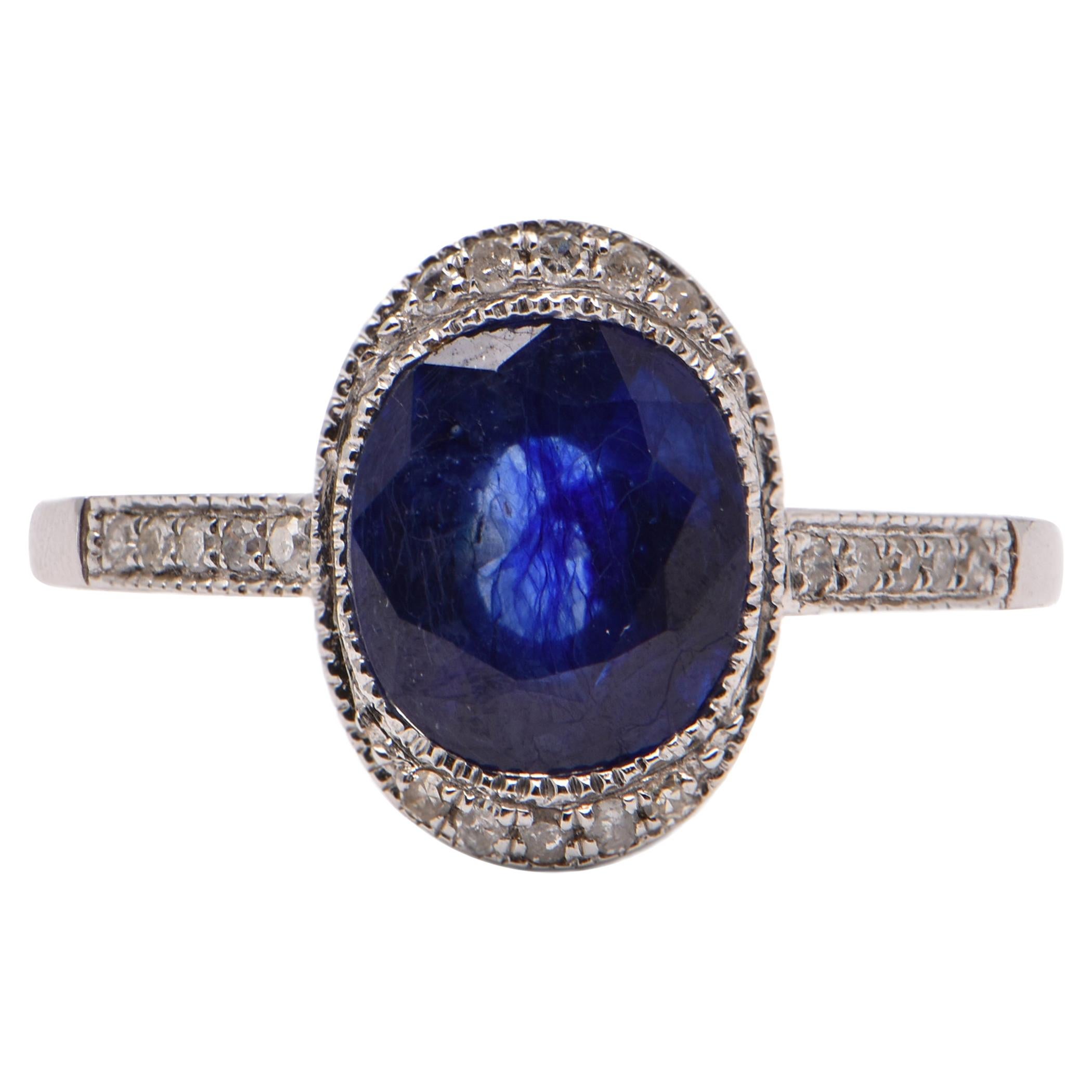 Oval Sapphire 'Treated' and Diamond Cocktail Ring in 18 Carat White Gold For Sale