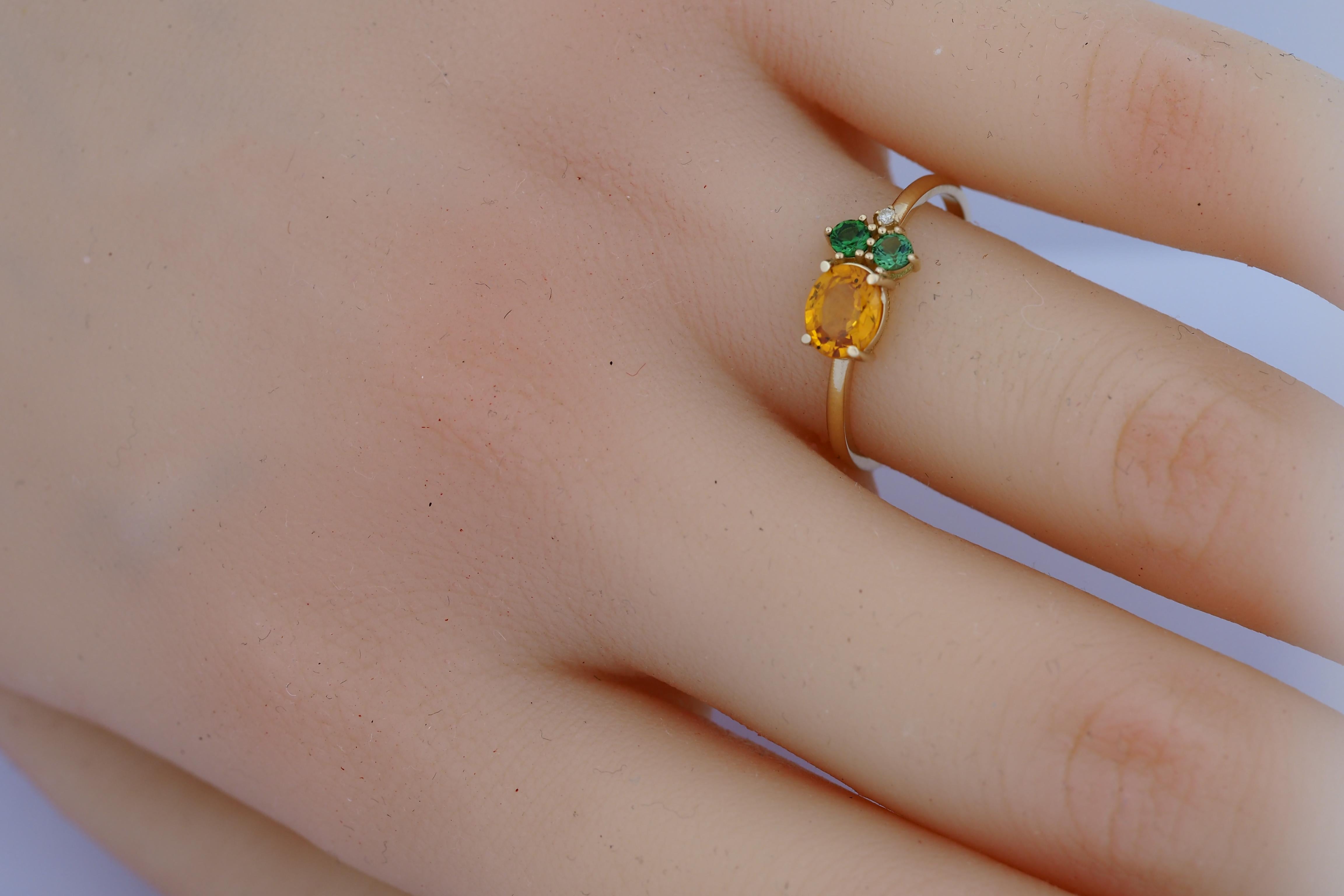 Oval sapphire, tsavorite and diamonds 14k gold ring.
Yellow, orange sapphire gold ring. Sapphire cluster ring. Sapphire engagement ring.

Metal: 14k gold
Weight: 1.8 gr (depends from size)

Gemstones:

Set with sapphire color - orange to yellow (can