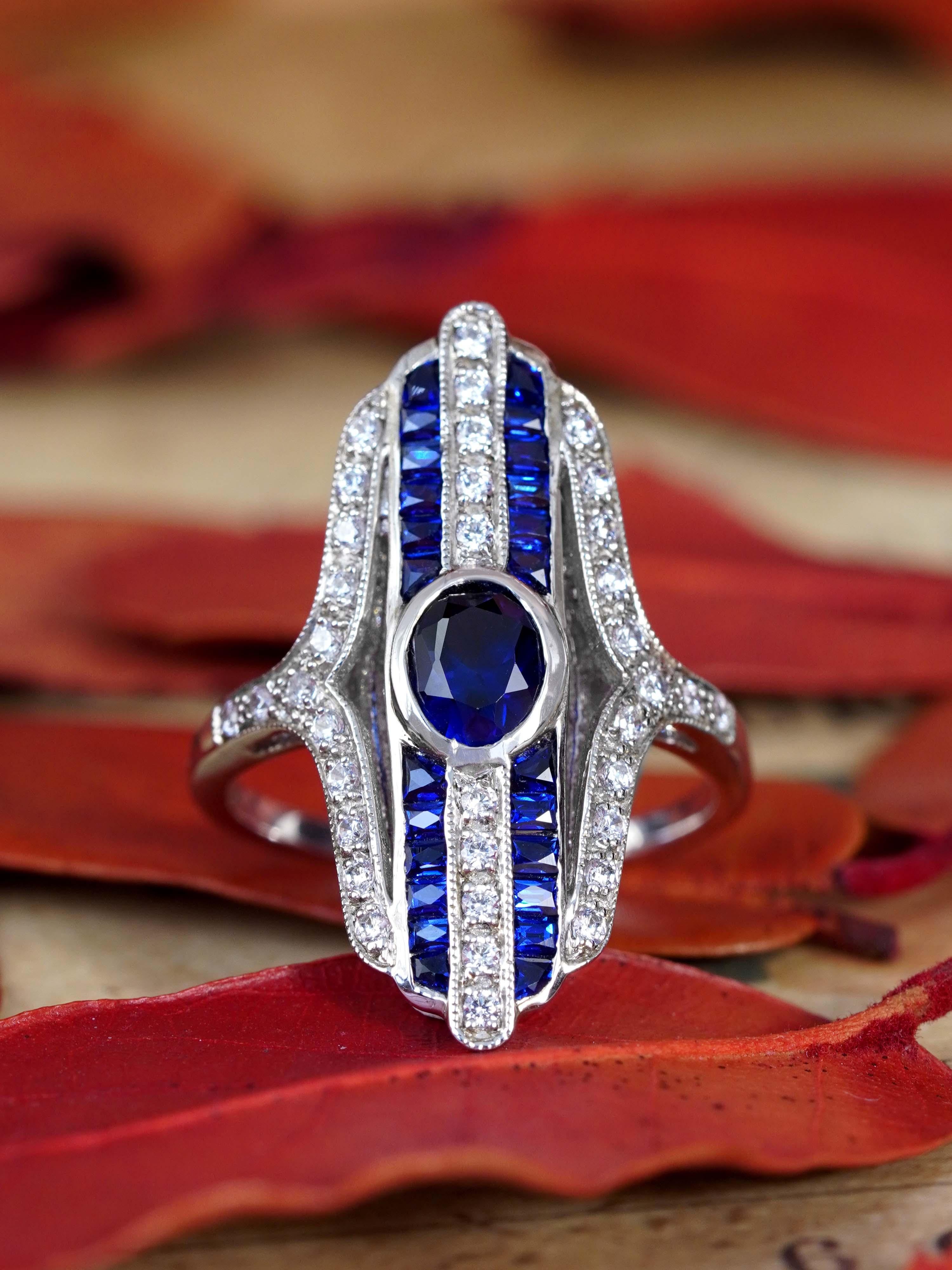 Cocktailring mit ovalem Saphir und Diamant im Art-Déco-Stil aus 18 Karat Weißgold (Ovalschliff) im Angebot