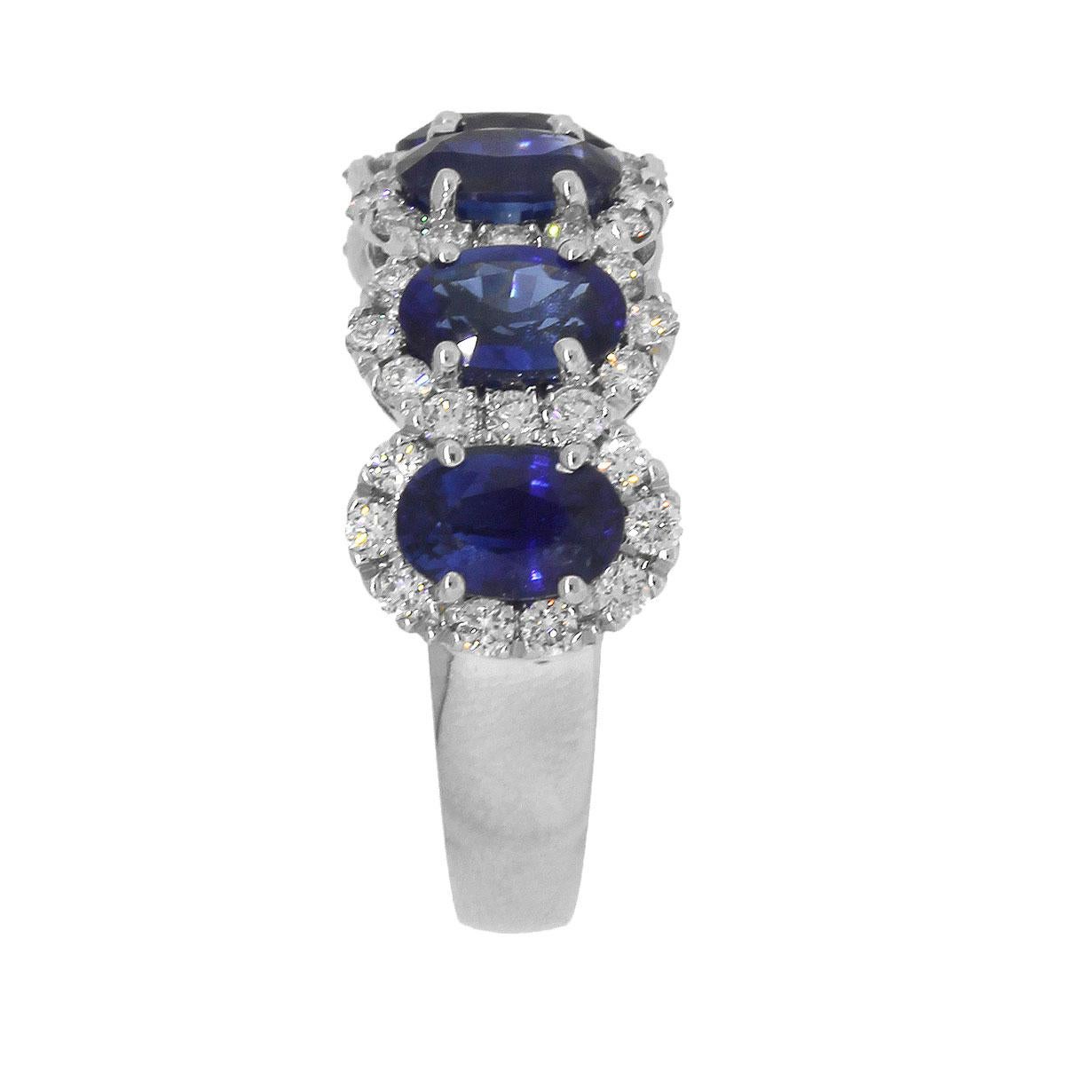 Material: 18k White Gold
Sapphire Details: Approximately 3ctw of Oval Sapphire Gemstones.
Diamond Halo Details: Approximately 0.60ctw of round brilliant diamonds. Diamonds are G/H in color and SI in clarity.
Size: 6.25
Total Weight: 6.5g
