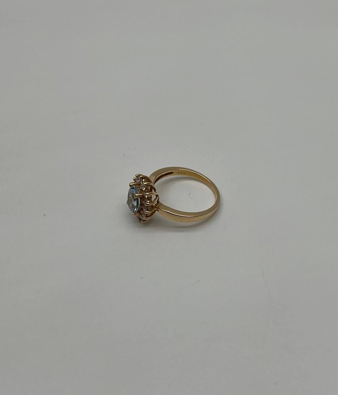 Oval Cut Oval Shape Blue Aquamarine Floral Flower 14K Yellow Gold Diamond Halo Ring For Sale