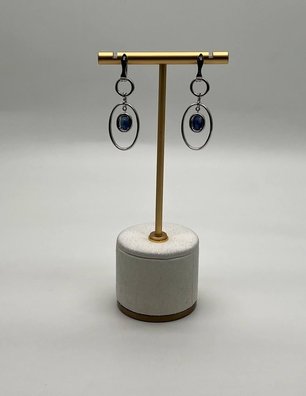 Contemporary Oval Shape Blue Sapphire 14K White Gold Diamond Halo Drop Statement Earrings For Sale