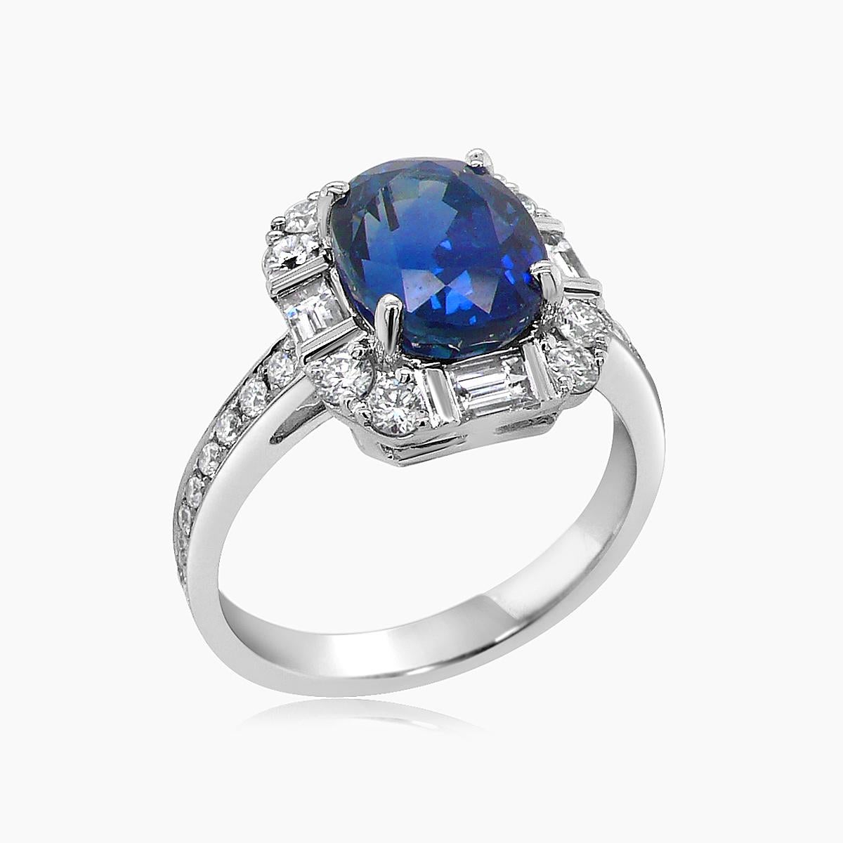 Oval Shape Blue Sapphire & Baguette White Diamond 18K White Gold Halo Ring In New Condition For Sale In Oakton, VA