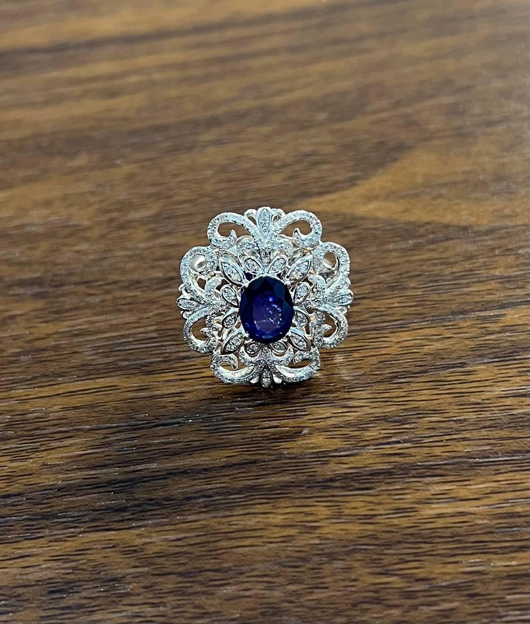 Oval Shape Blue Sapphire Diamonds Halo Pave Set White Gold Statement Motif Ring In New Condition For Sale In Oakton, VA