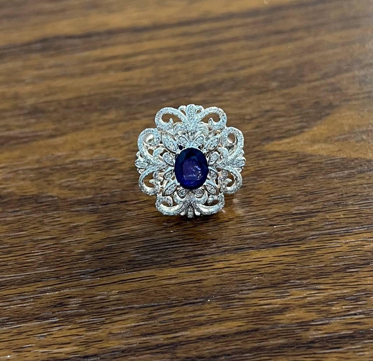 Women's Oval Shape Blue Sapphire Diamonds Halo Pave Set White Gold Statement Motif Ring For Sale