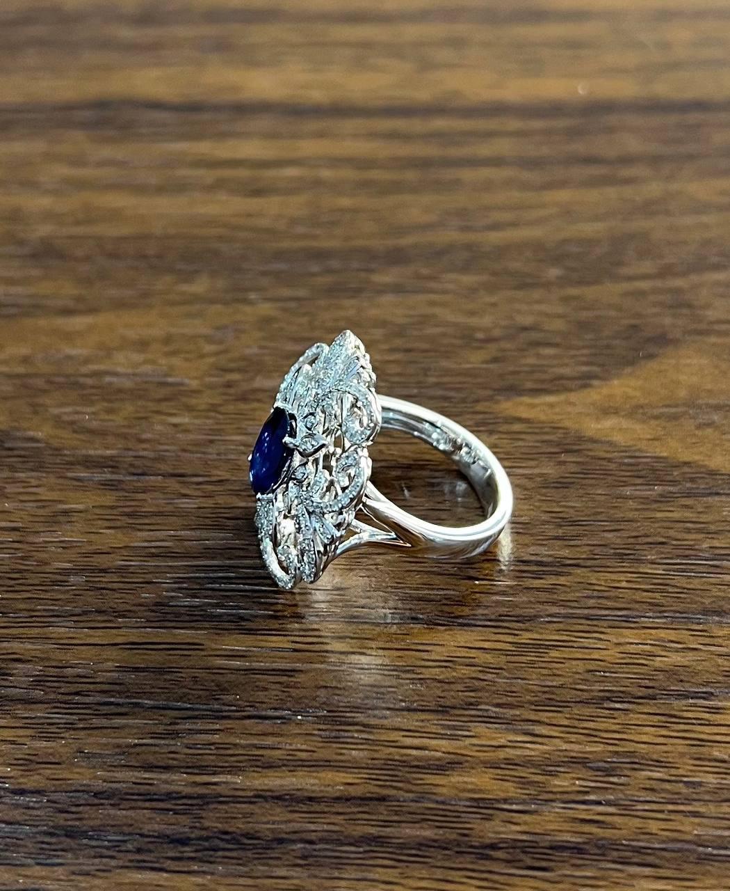 Oval Shape Blue Sapphire Diamonds Halo Pave Set White Gold Statement Motif Ring For Sale 2