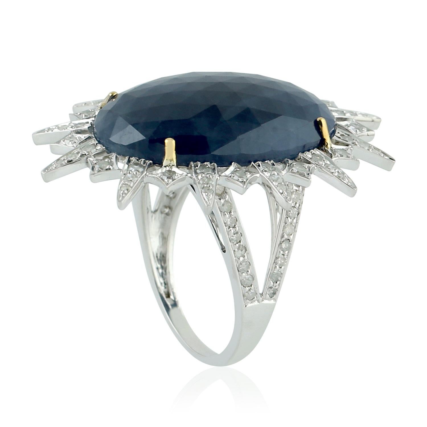 Stunning this oval shape faceted Blue Sapphire Ring set in sun motif with diamonds in Gold And Silver is simply  very attractive.

Ring Size 7 ( Can be sized )

18KT Gold:3.155gms
Diamond:0.86ct
SiIver:2.111gms
Sapphire:13.49cts
