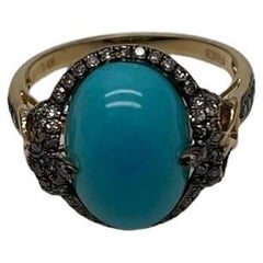 Bague en or jaune 14 carats de forme ovale, avec turquoise bleu sarcelle et halo de diamants pavés