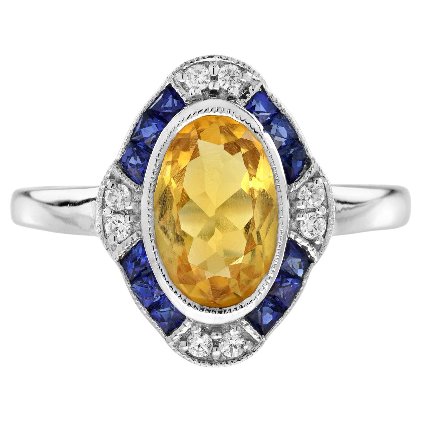 Anillo de Oro Blanco Estilo Art Decó con Halo de Diamantes y Zafiro Azul y Citrino de Forma Ovalada