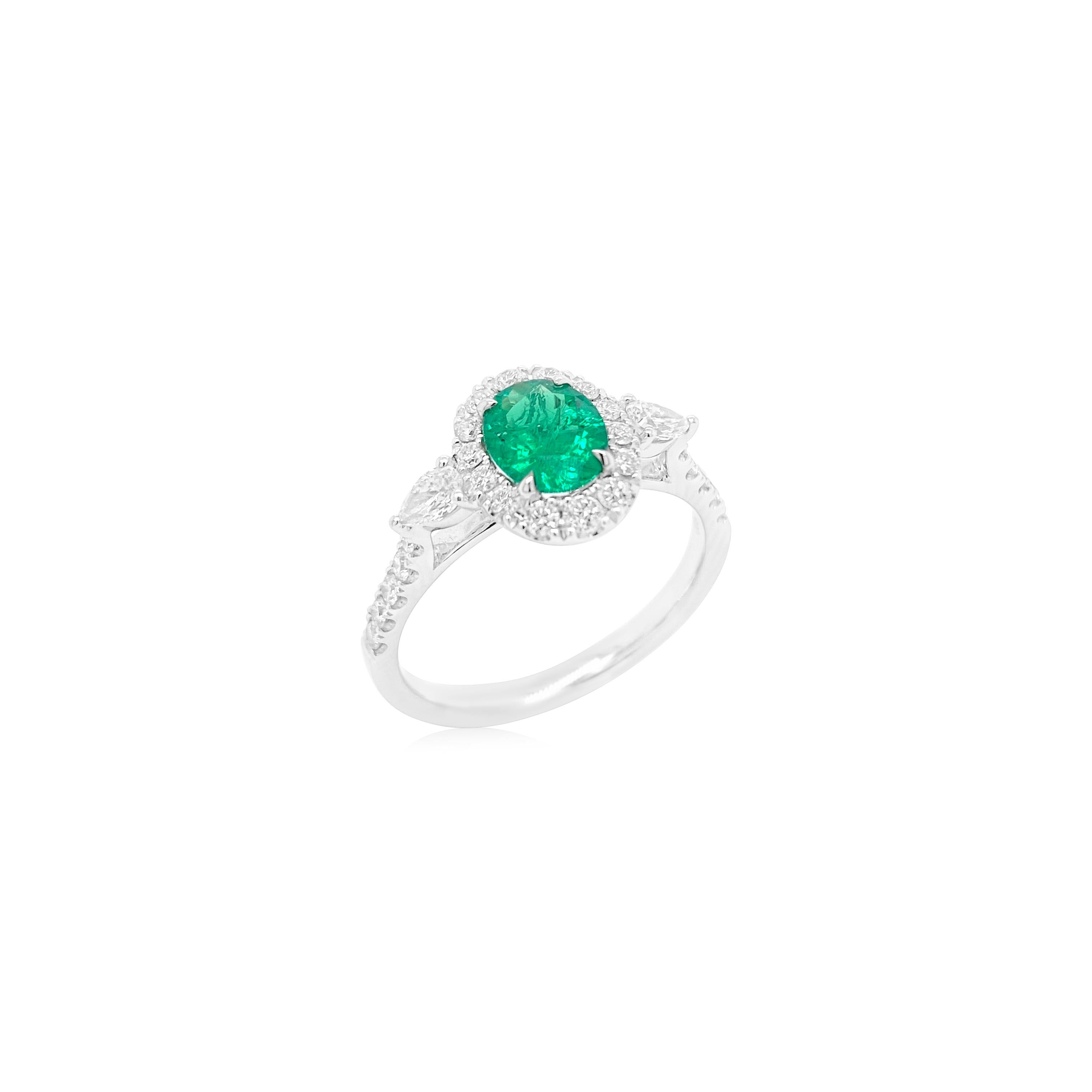 Oval Cut Oval Shape Colombian Emerald Ring with Pear shape white Diamonds For Sale