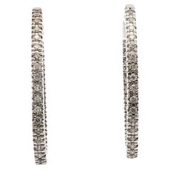 Orecchini a cerchio ovali con diamante interno ed esterno