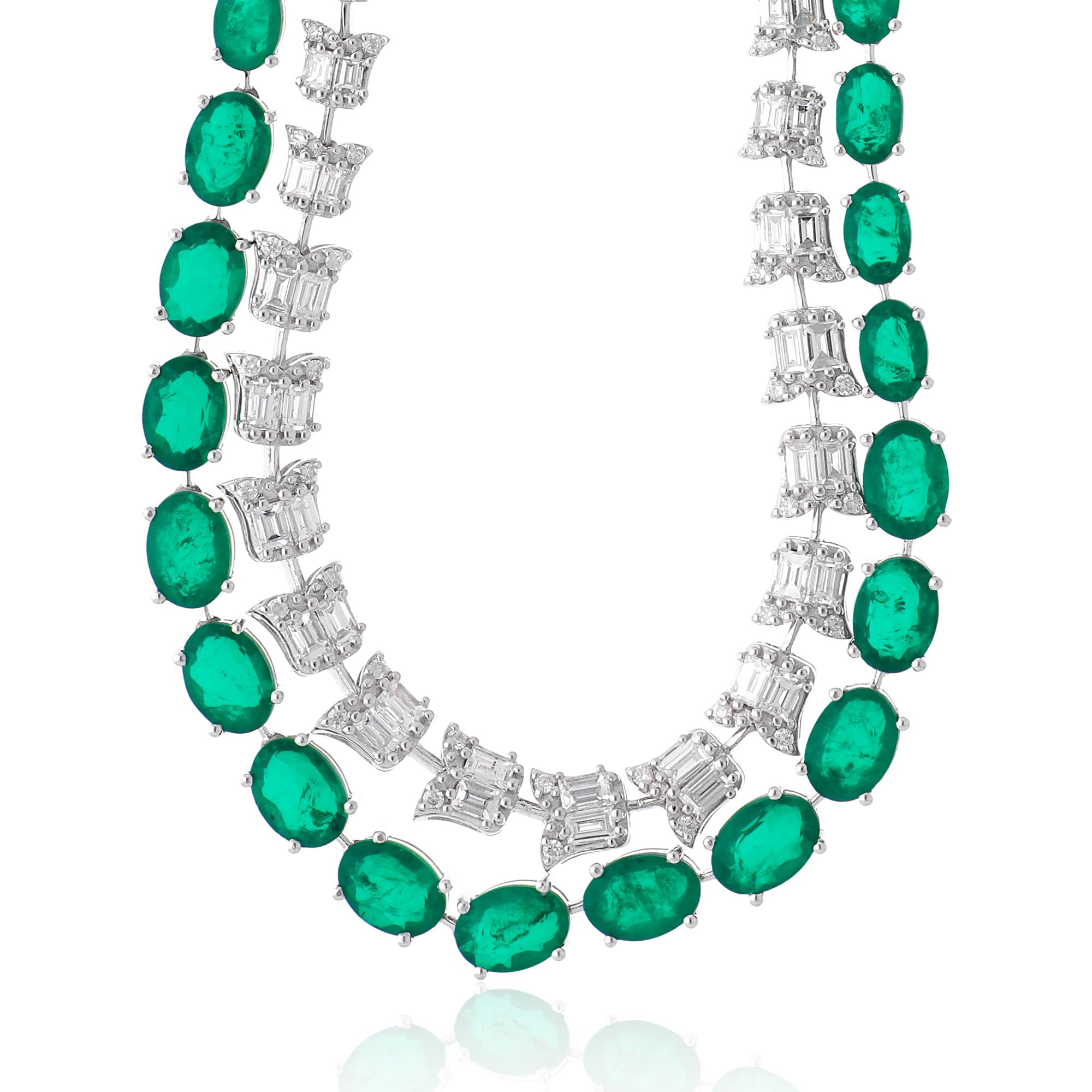 Introducing our exquisite oval-shaped emerald gemstone fine necklace with baguette diamonds, a captivating piece of fine jewelry meticulously crafted in 14 karat white gold. This necklace showcases the timeless beauty of emeralds and the brilliance