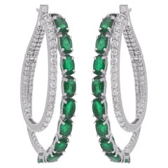 Orecchini a cerchio con gemma smeraldo di forma ovale Gioielli in oro bianco 14 carati con diamante