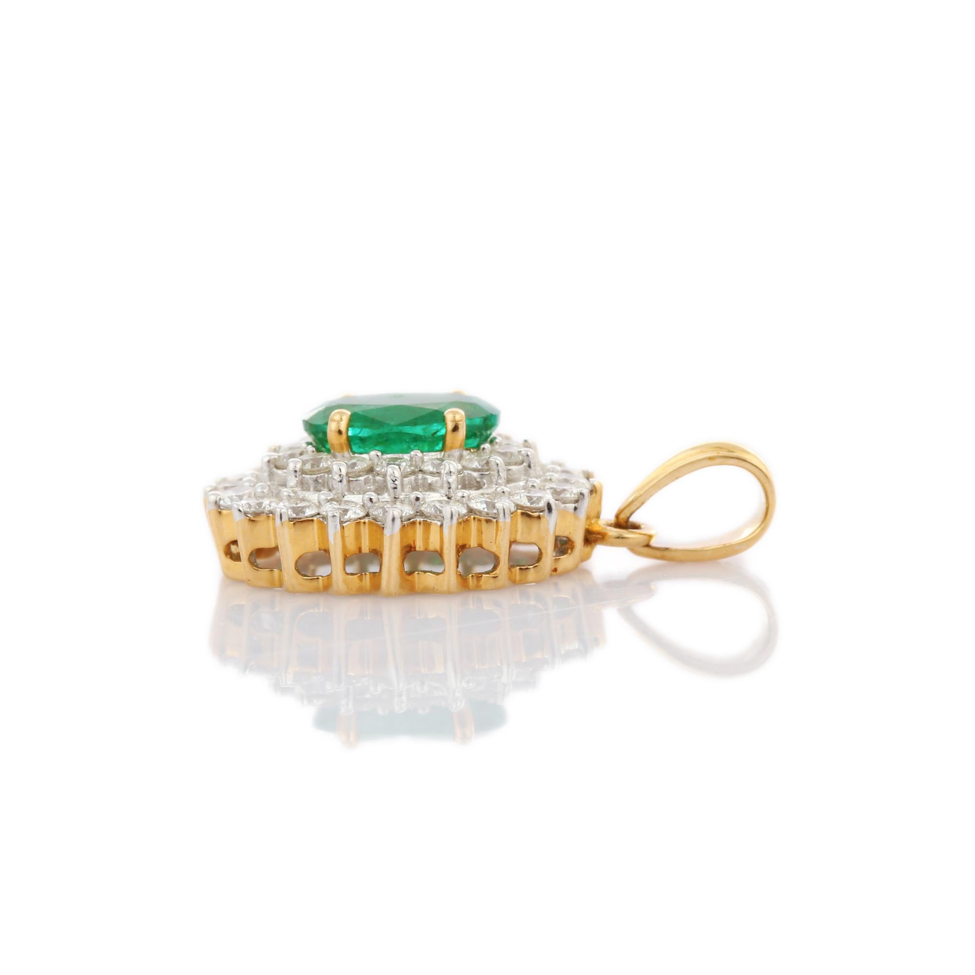 Artist Oval Shape Emerald Pendant with Halo of Diamonds in 18K Yellow Gold For Sale