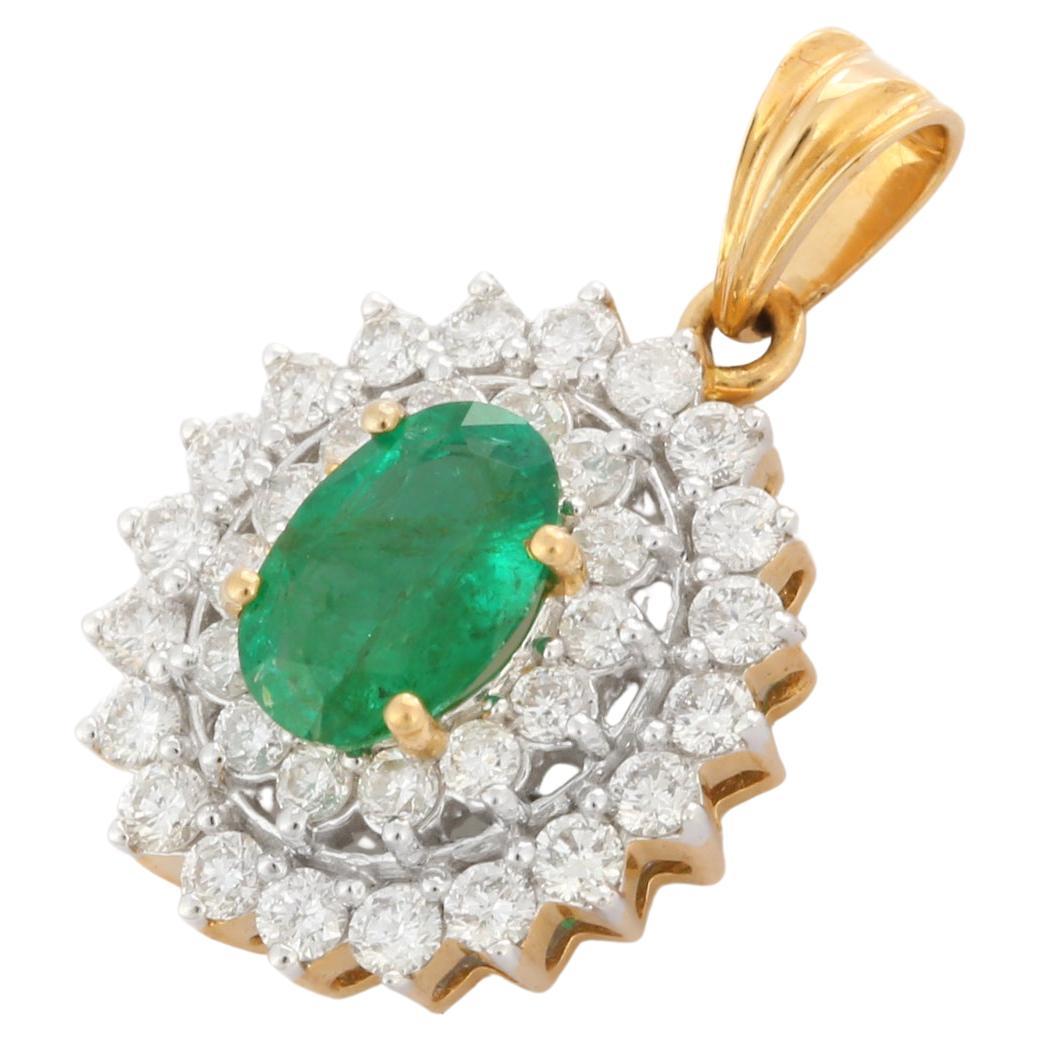 Oval Shape Emerald Pendant with Halo of Diamonds in 18K Yellow Gold For Sale