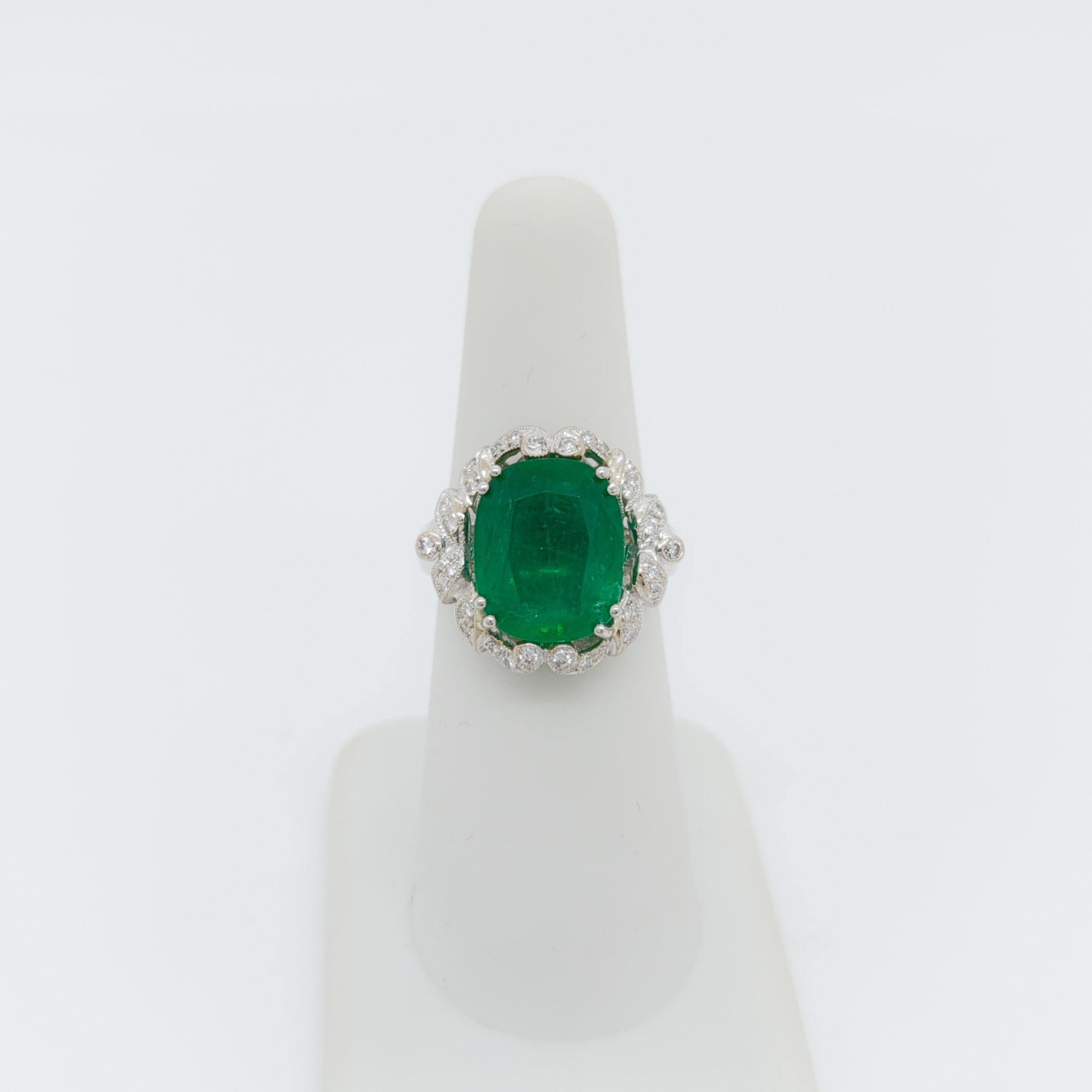 Oval Cut Oval Shape Emerald & Round Shape Diamond Ring in 18K White Gold For Sale