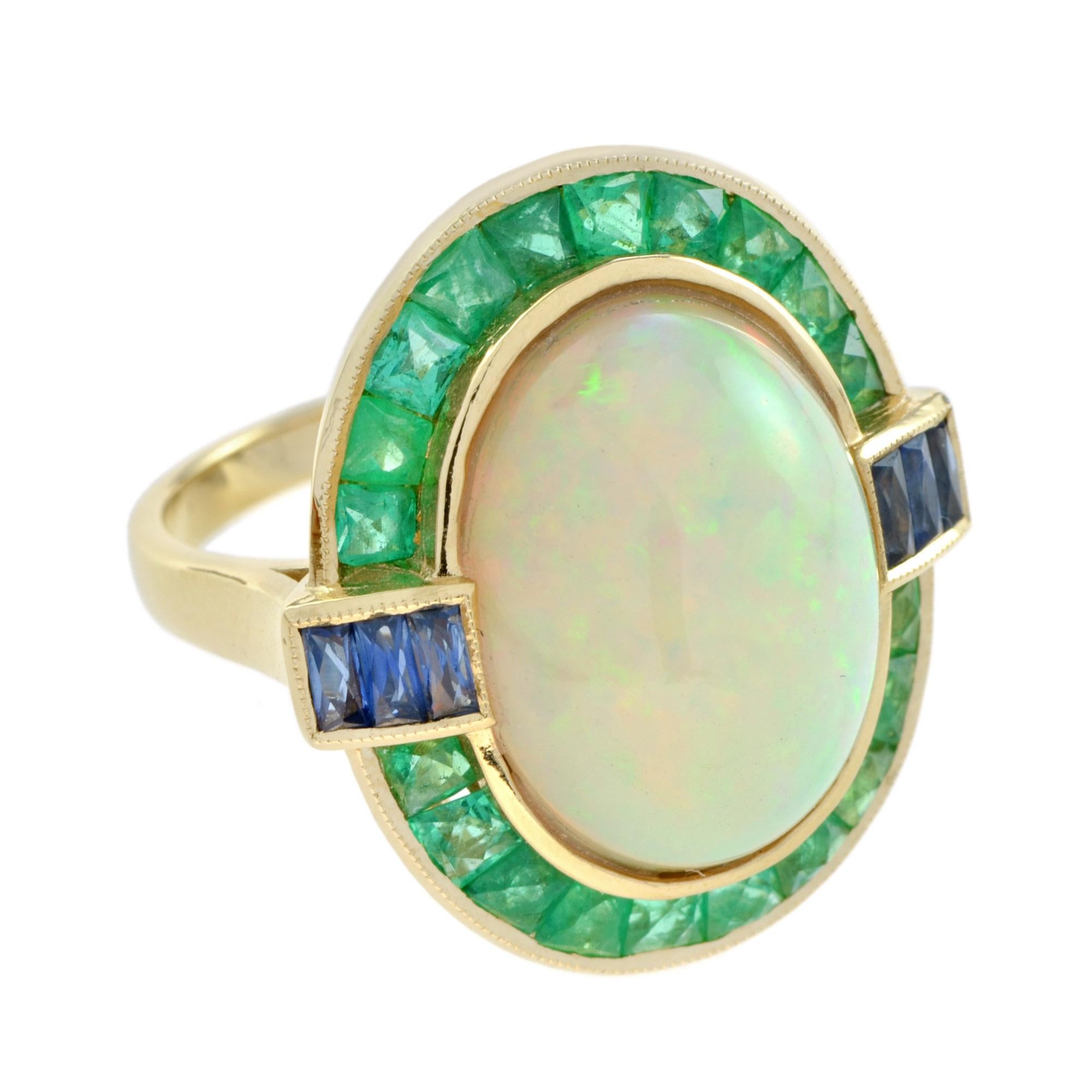 This gorgeous Opal cocktail ring crafted of 18k yellow gold and features a 6.49 carat center stone. The ring is and accented with French cut emerald and punctuated east and west with French cut sapphires .
Ring Information
Style: Art-deco
Metal: 18K