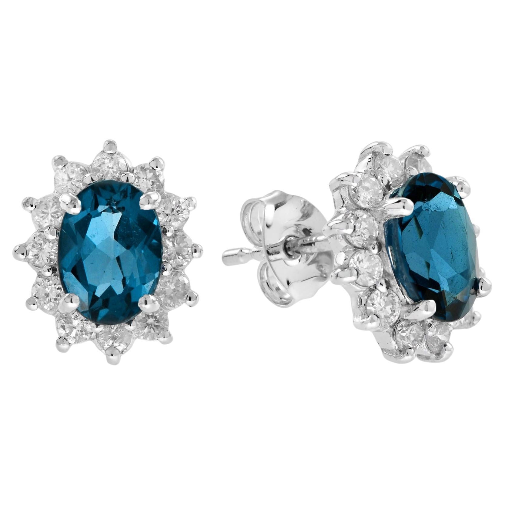 Ovale Form Londoner Blautopas & Diamant Halo 14K Weißgold Ohrstecker
