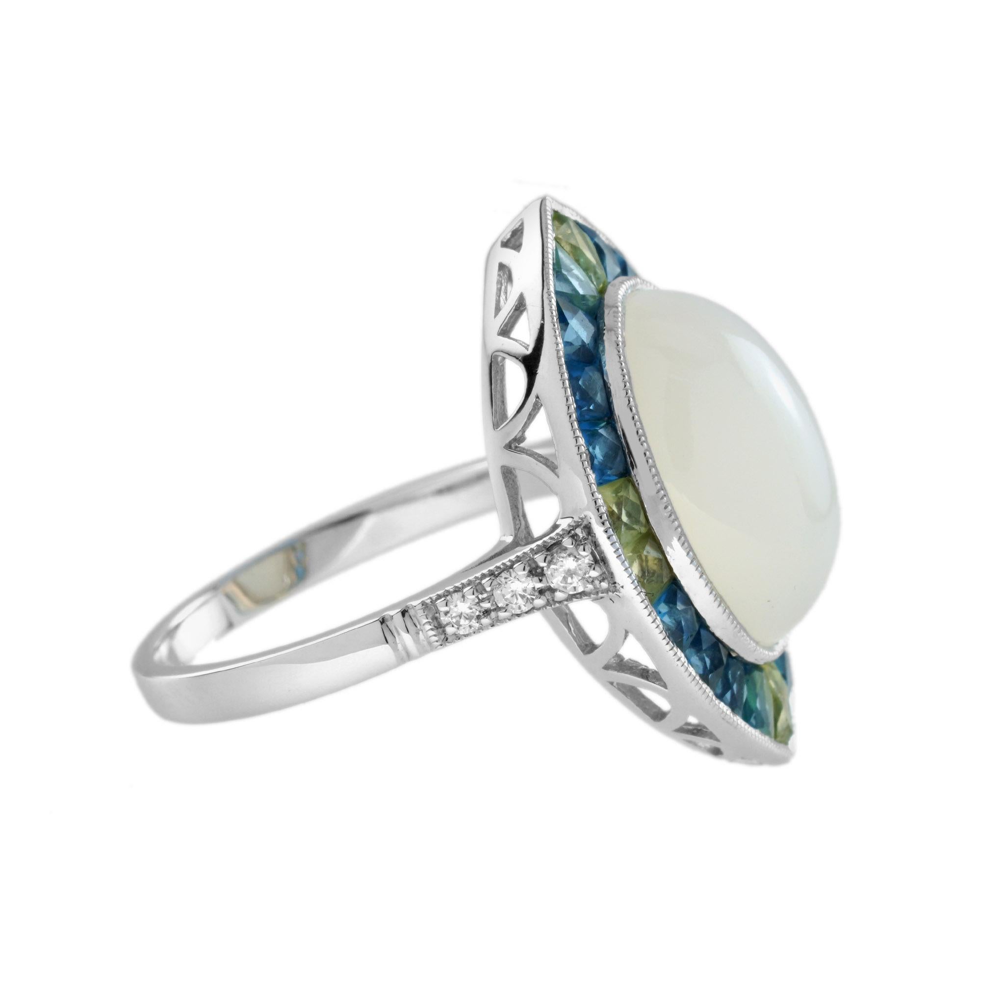 Taille ovale Bague de cocktail de forme ovale en pierre de lune, diamant, topaze bleue et péridot de style Art déco en vente