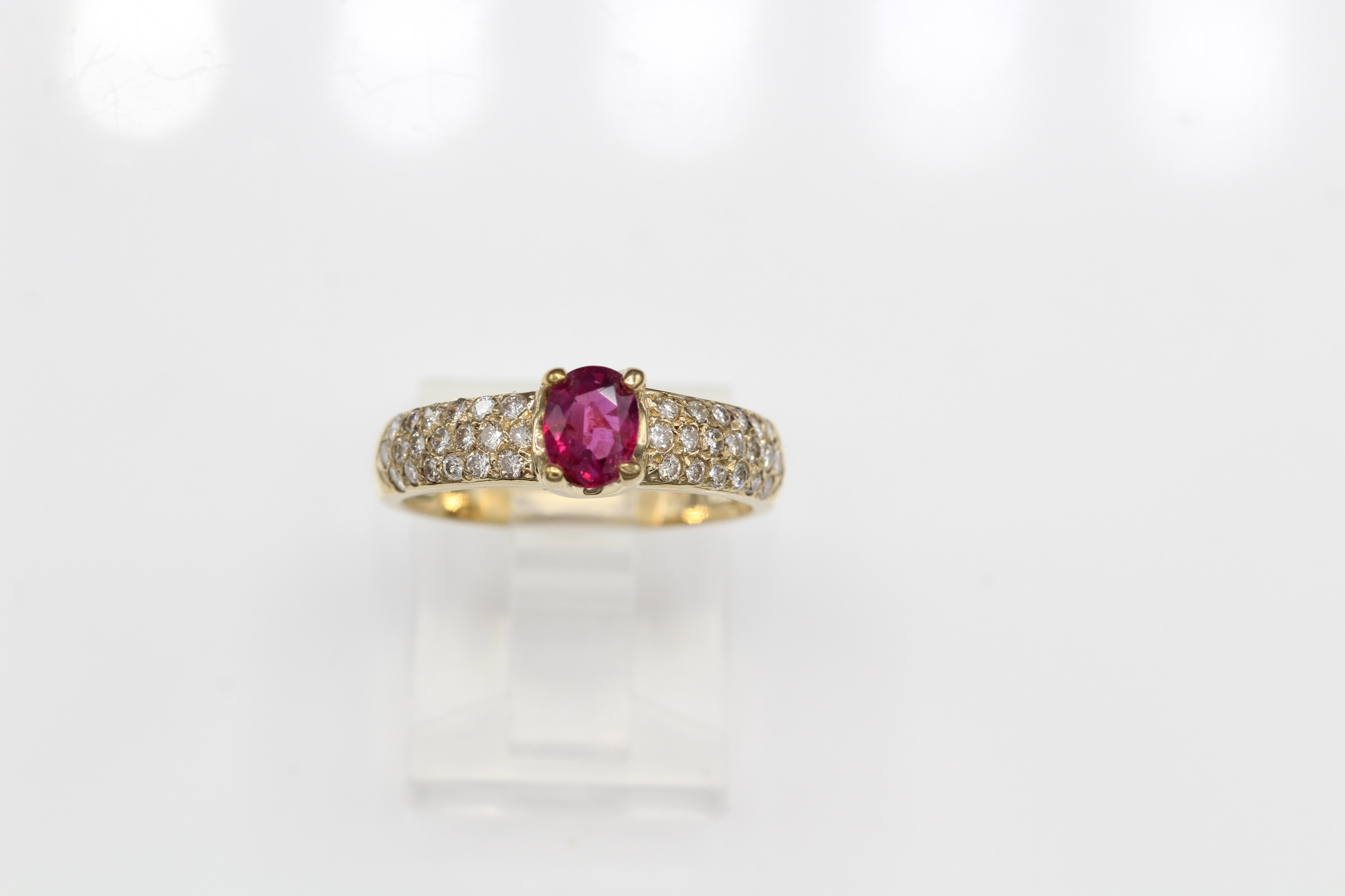 Classic Ruby Ring-Ruby is 0.65 carat Diamond 0.50 carat GH-VS.
14K Yellow Gold 2.70 Grams, Finger Size 6.5
All natural stones
