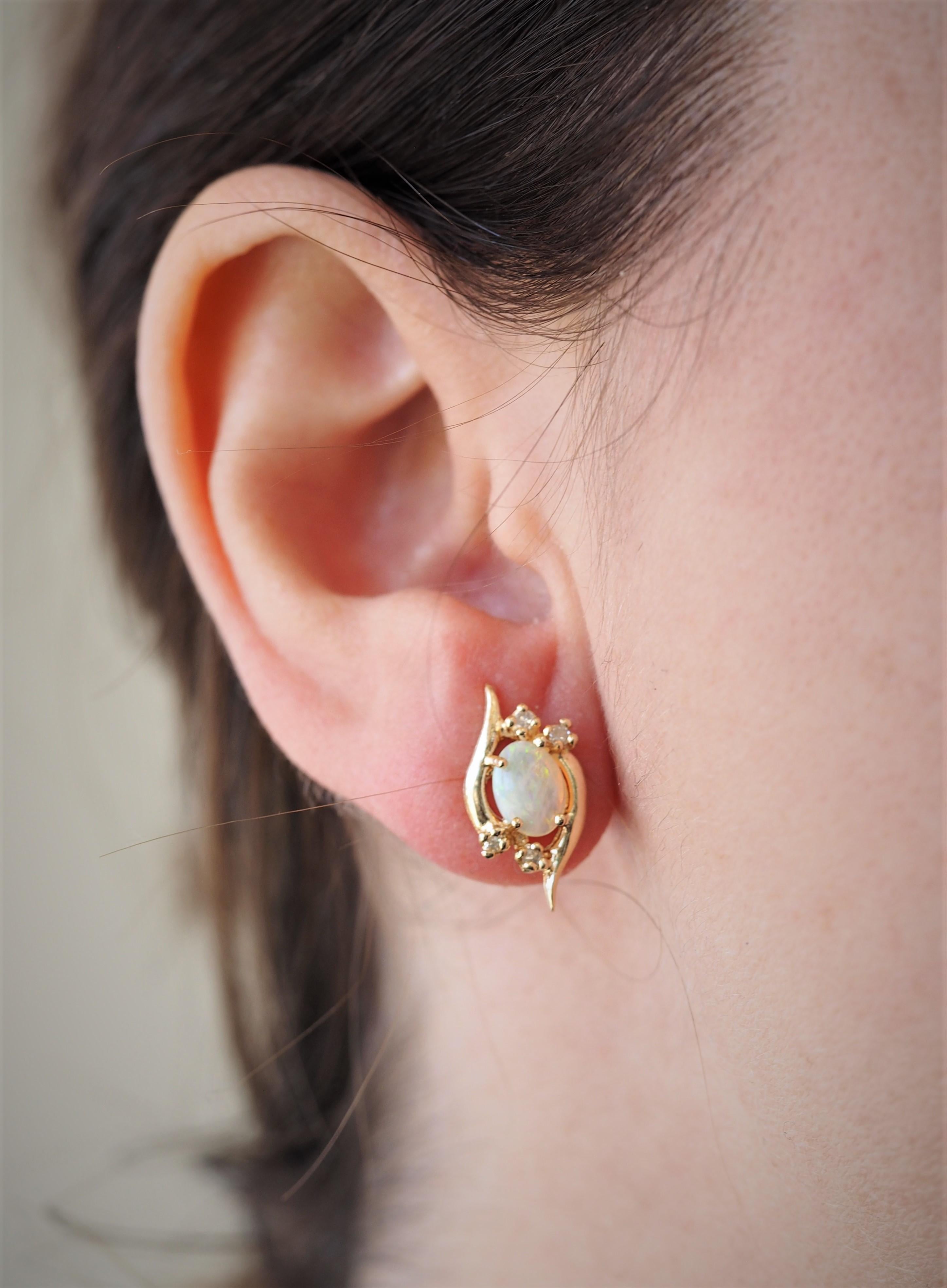 Round Cut Oval Shape Opal and Diamond Stud Earrings of 14 Karat Yellow Gold