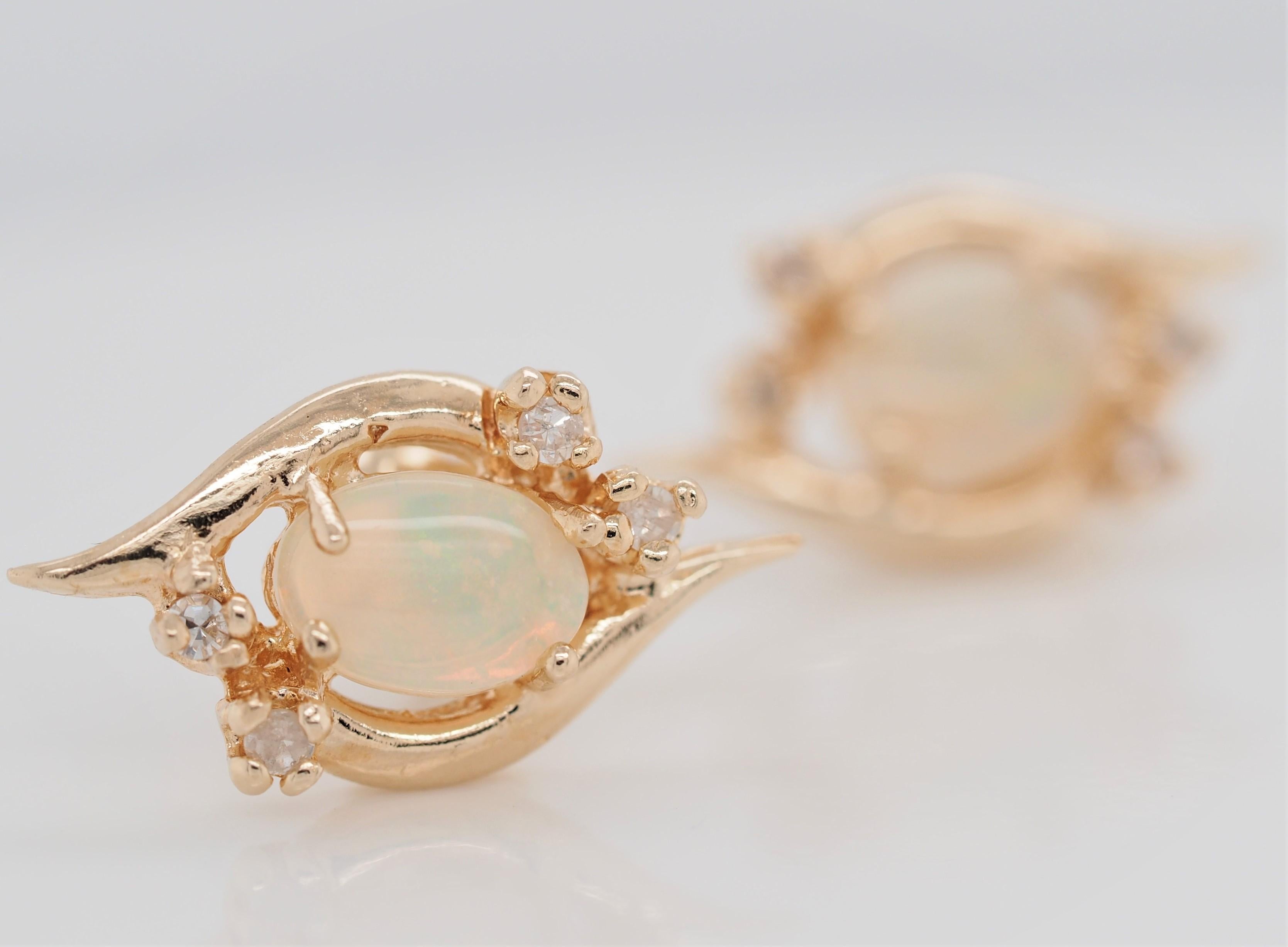 Women's or Men's Oval Shape Opal and Diamond Stud Earrings of 14 Karat Yellow Gold