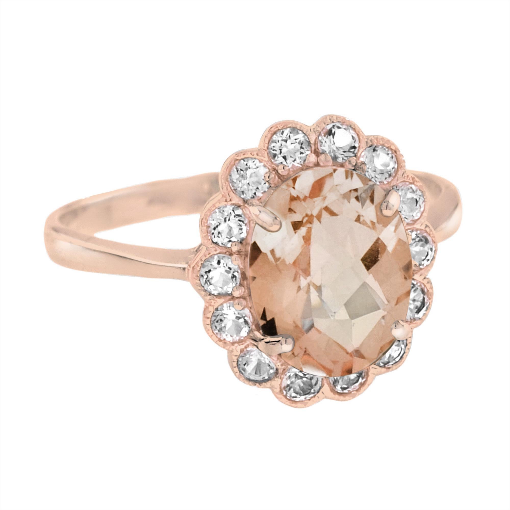A sunburst halo of brilliant diamonds blooms around the center morganite of your choosing in this timeless classic ring. The oval 2.5-carat morganite halo ring showcases fourteen round diamonds beautifully set in an 18k gold setting.
Ring